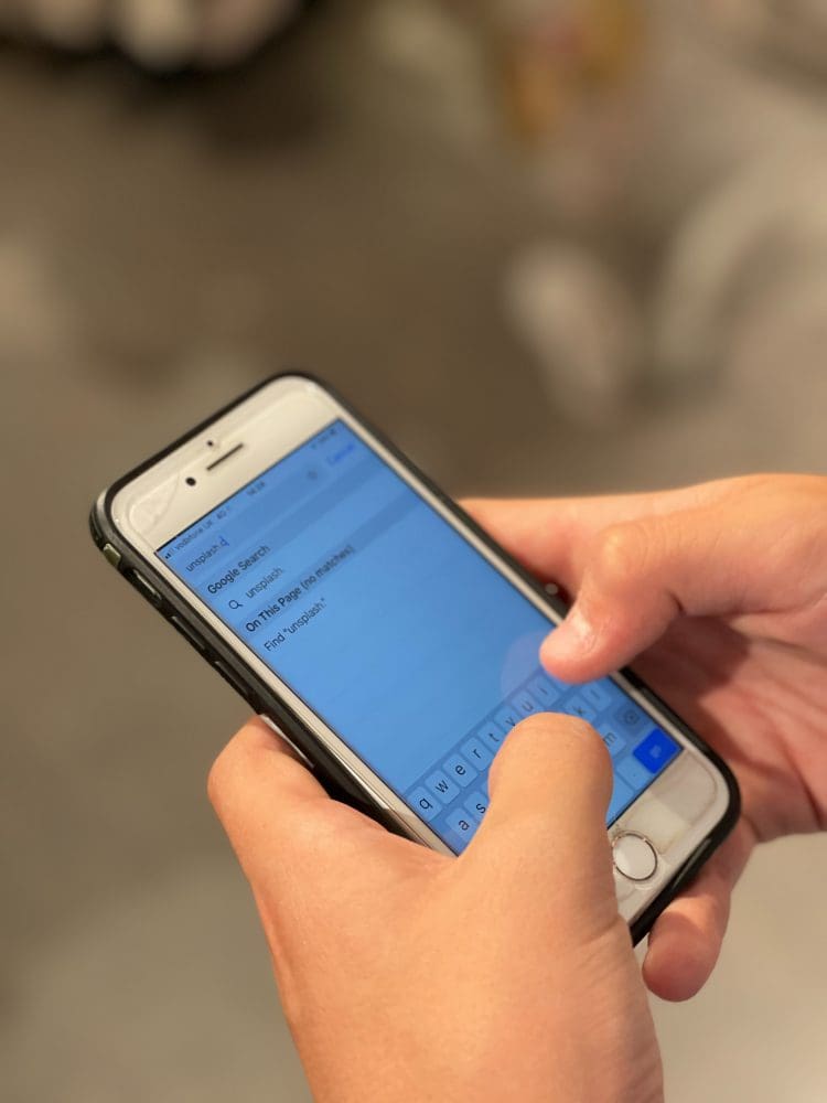 person searching on phone